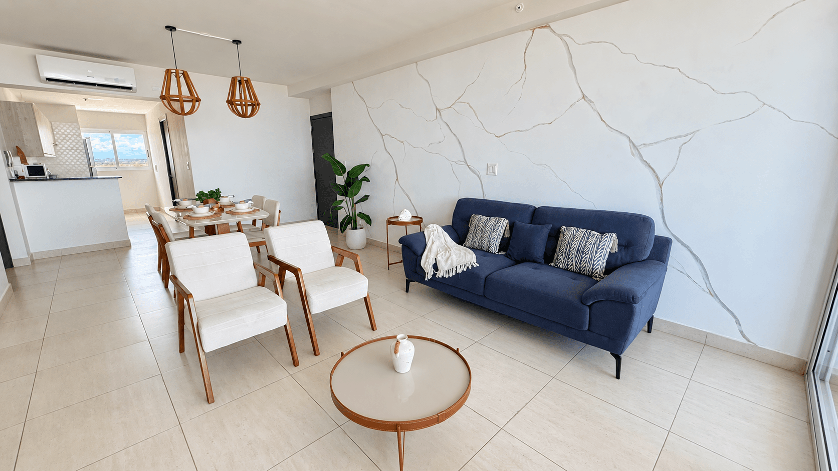 Distribución integrada de sala, comedor y cocina
